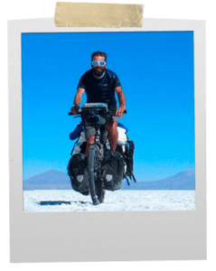 Root-b Founder Jeremy during his Cycling Tour of South America Salar de Uyuni - Bolivia with polaroid frame